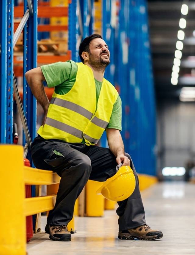 A,Storage,Worker,In,Pain,Having,Back,Pain,And,Massage A,Storage,Worker,In,Pain,Having,Back,Pain,And,Massage