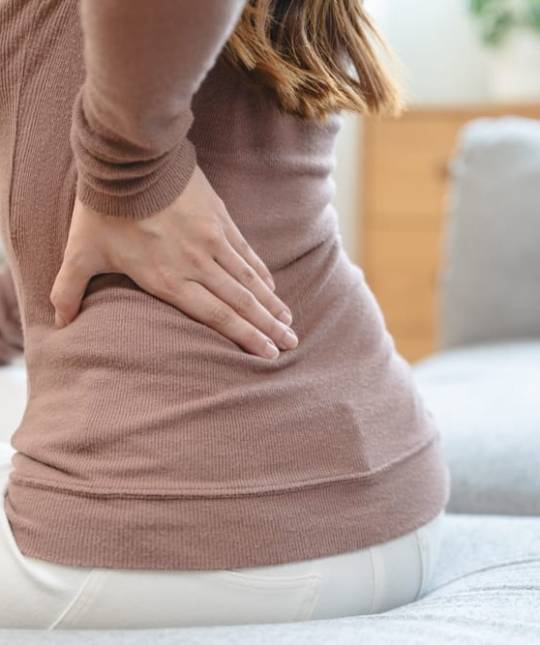 Office,Syndrome,In,Office,Worker,Concept,,Female,Touching,Her,Back