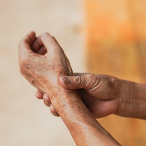 Senior,Woman,Holding,His,Painful,Wrist. Senior,Woman,Holding,His,Painful,Wrist.
